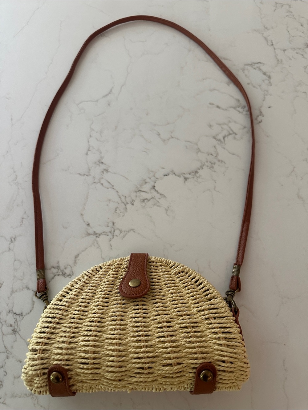 Woven Straw Crossbody Bag with Brown Shoulder Strap and Acents
